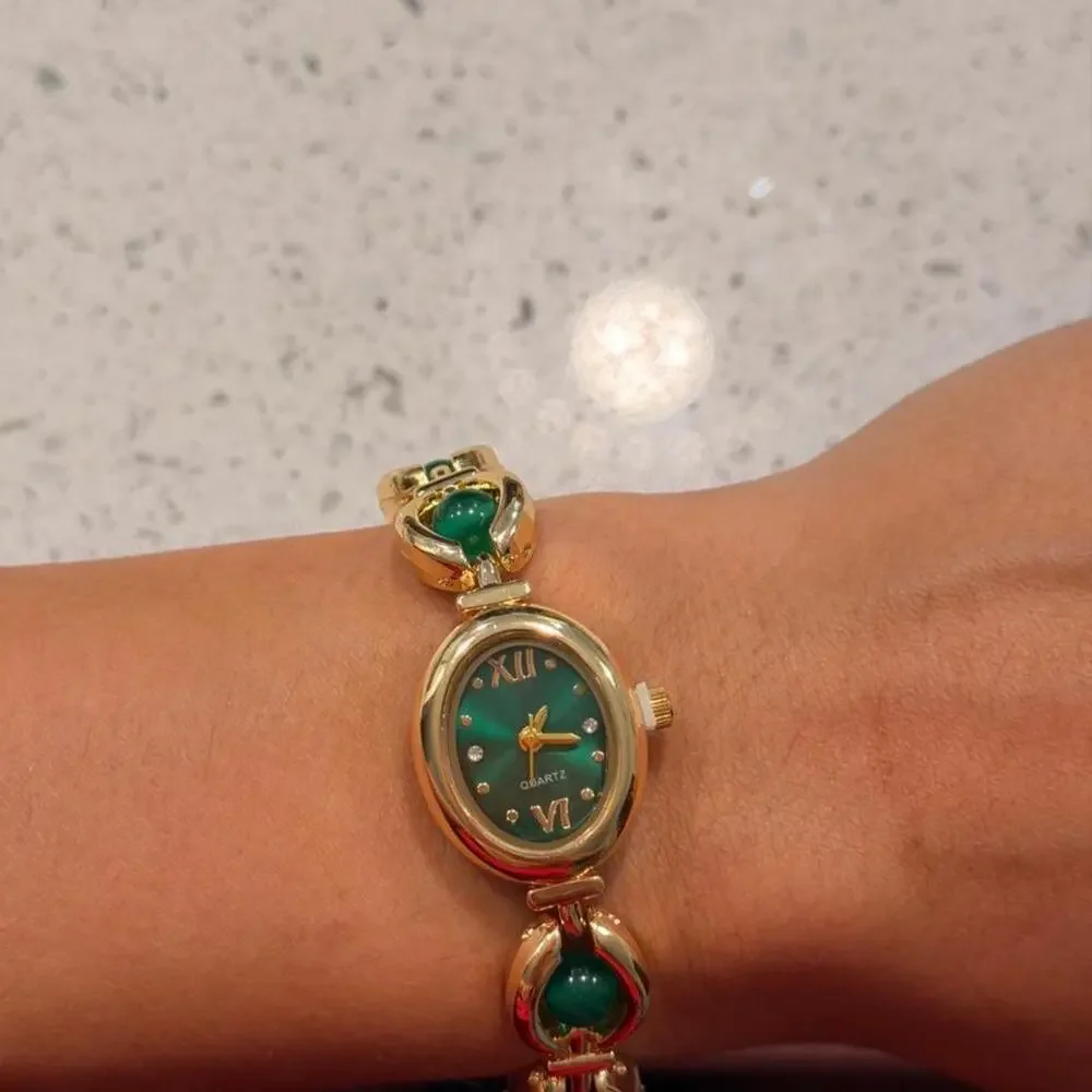 Gold and green vintage watch